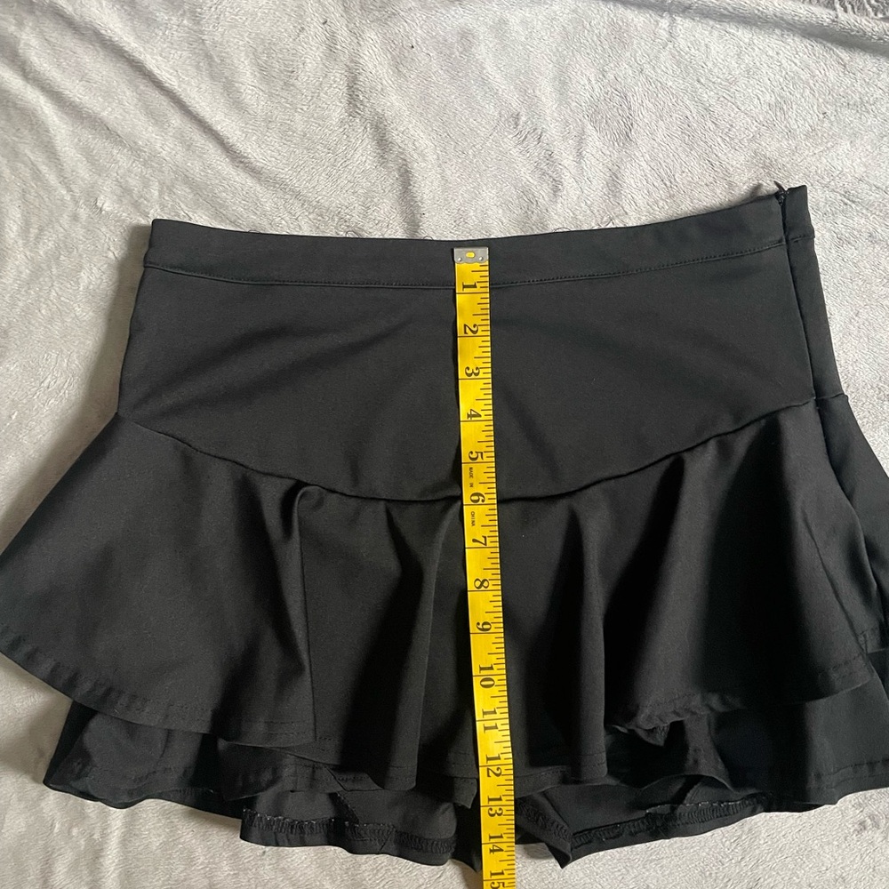 Athletic style pleated skort with zip on side - Picture 3 of 6